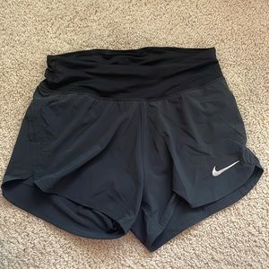 Size small Black dry-fit Nike running shorts ( tag still on )